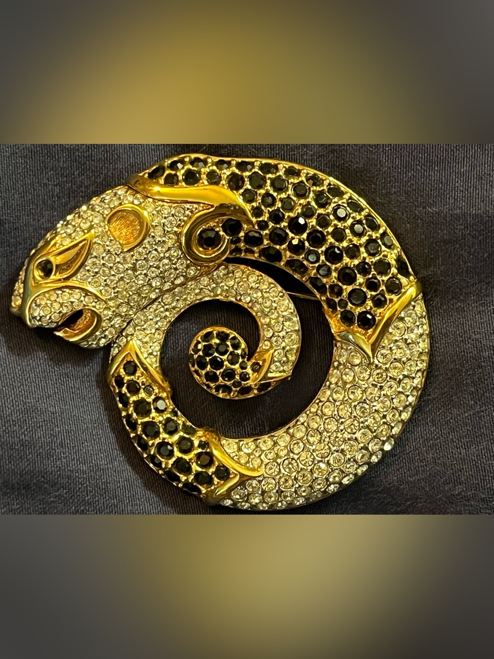 Retired Swarovski Gold-Toned Serpent/Cat Broach with Clear and Black Crystals